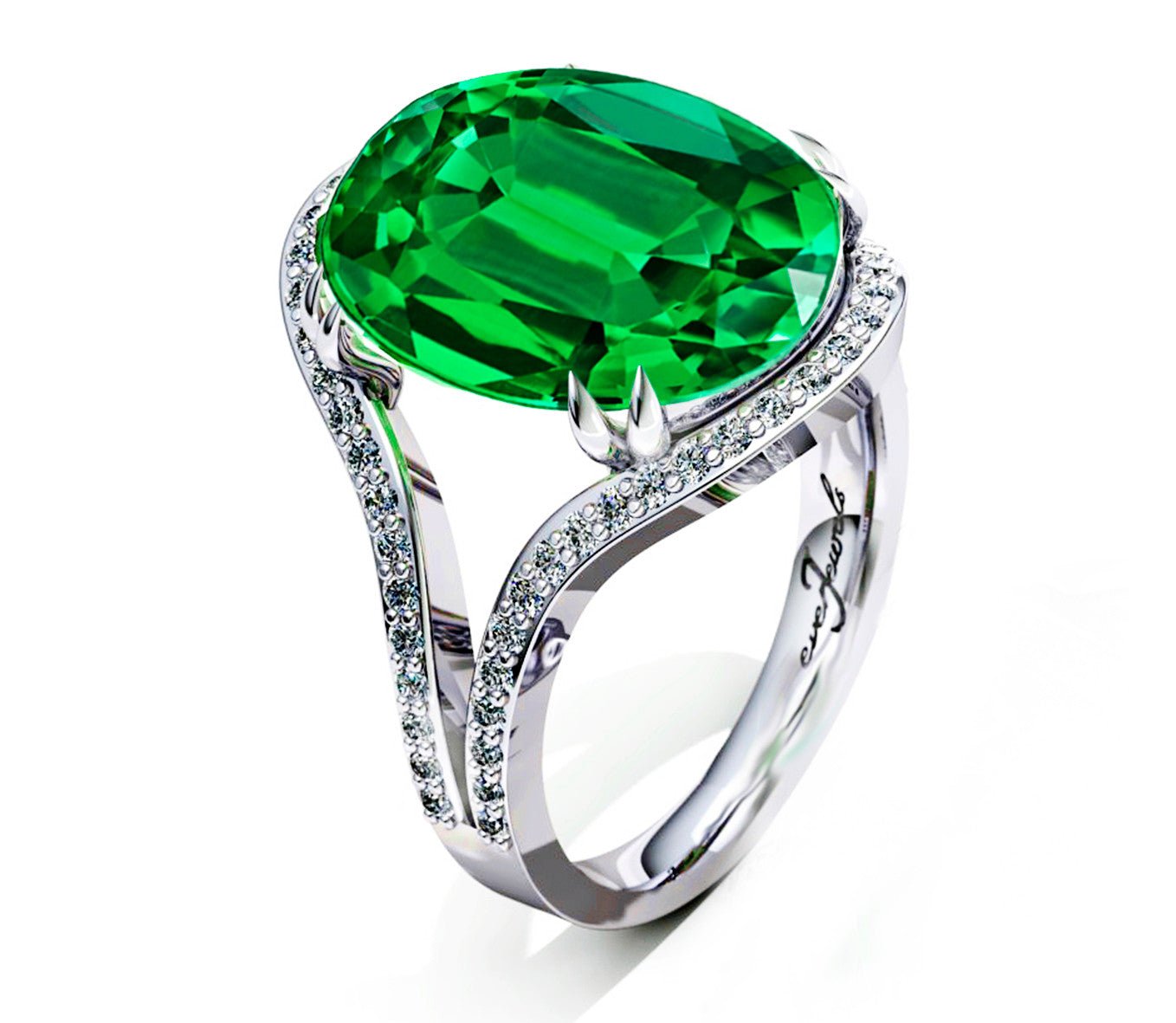 White gold ring with oval emerald and diamonds