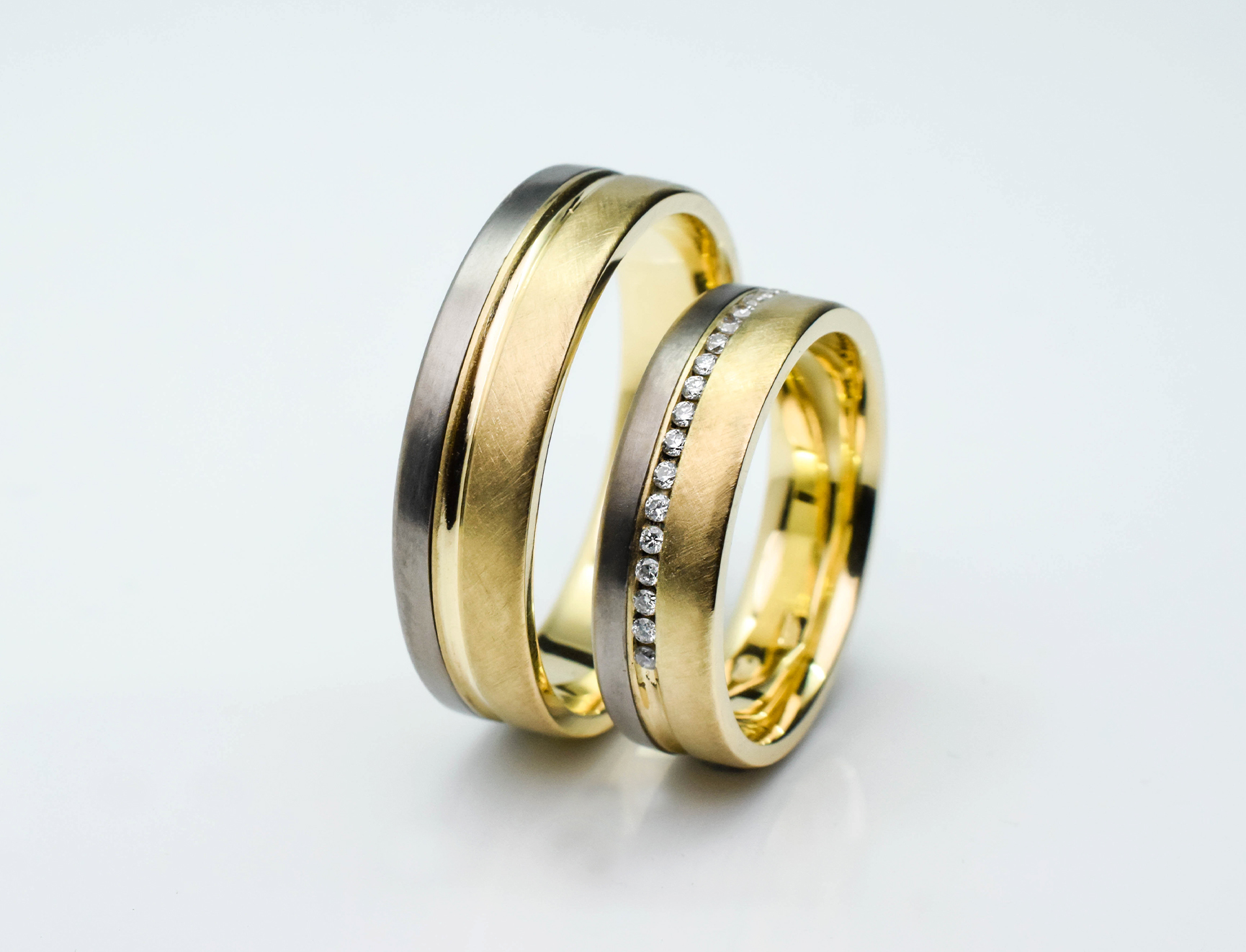 Two-tone wedding rings with diamonds