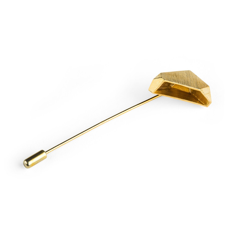 Gold lapel pin with faceted form