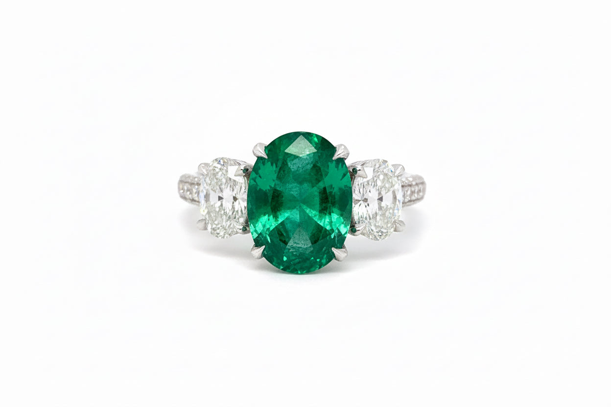 Trilogy 3.88ct Oval Emerald and diamond platinum ring