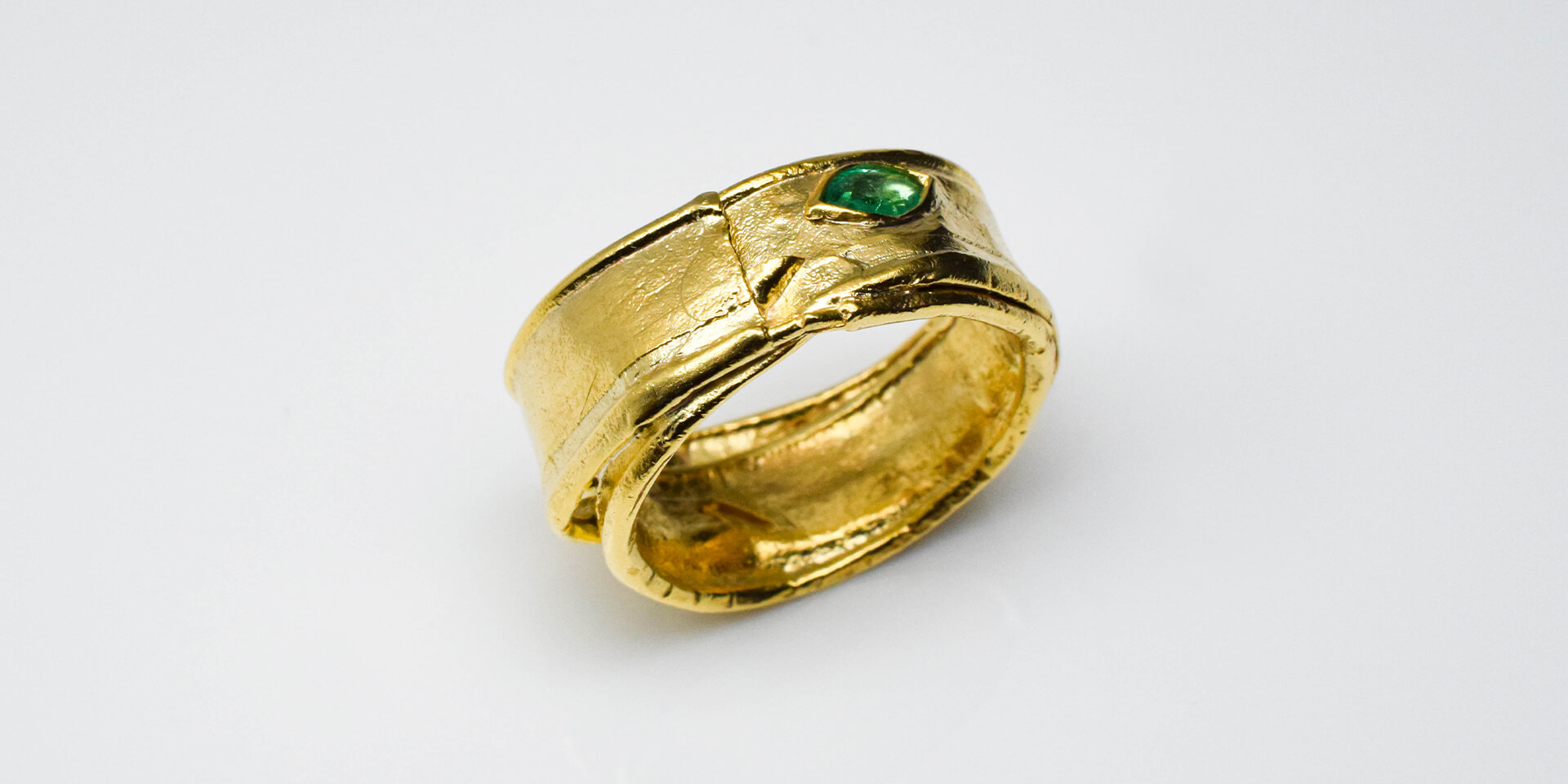 Gold ring with marquise emerald