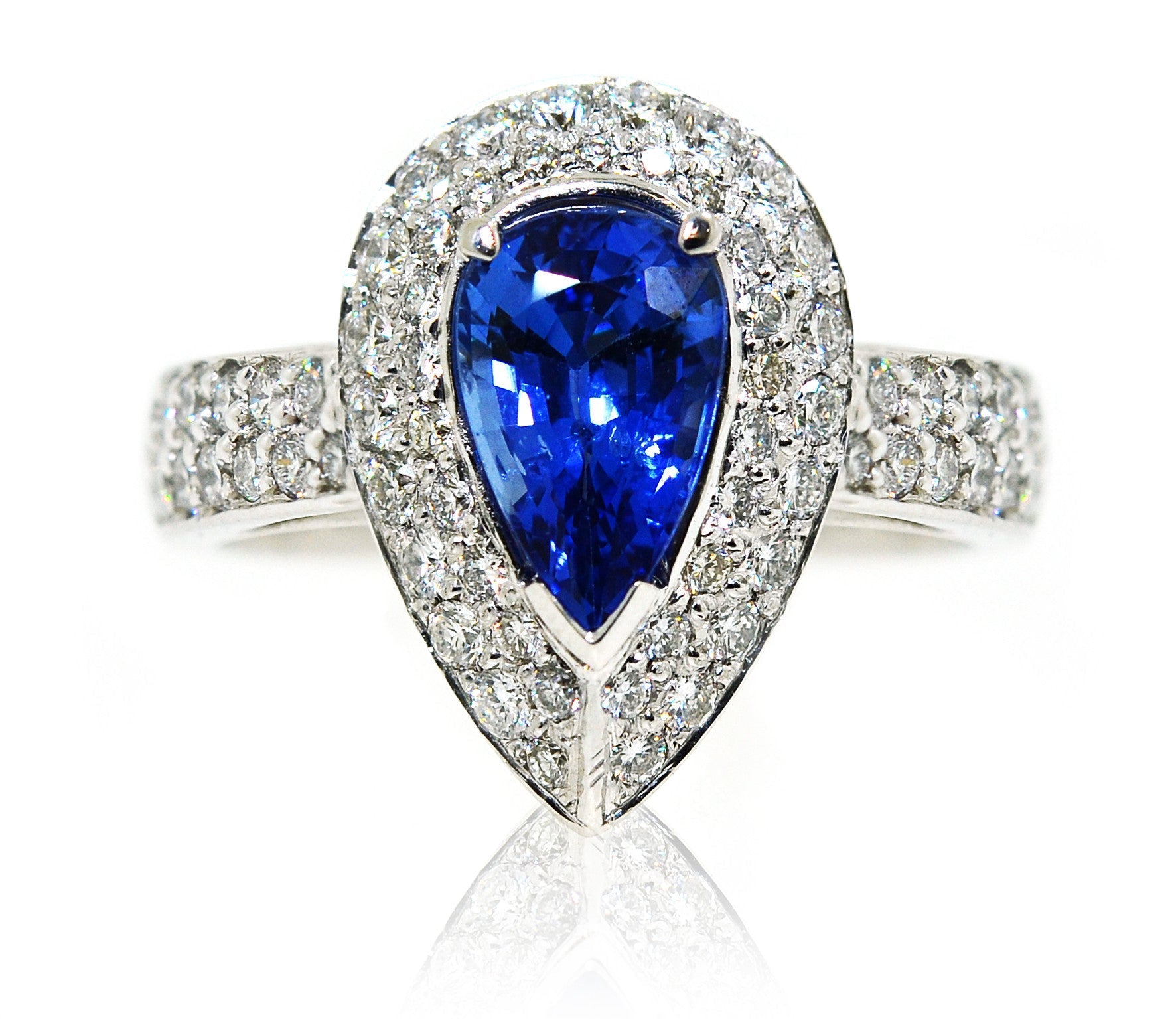White gold ring with pear-shaped sapphire and diamonds