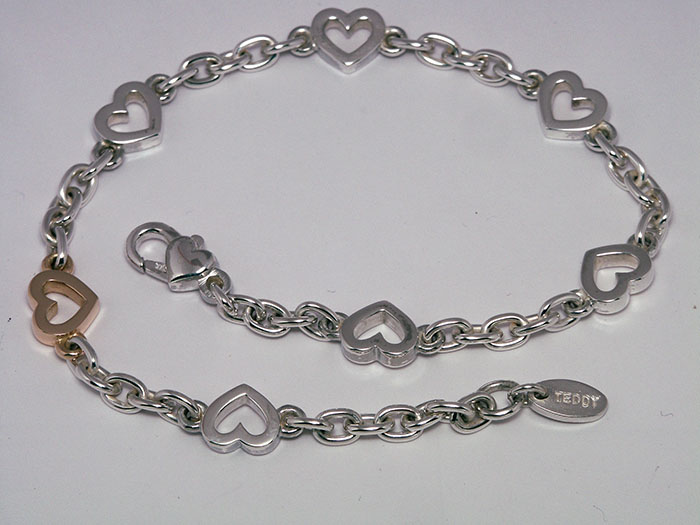 Armbånd i sølv med 7 åben hjerter
